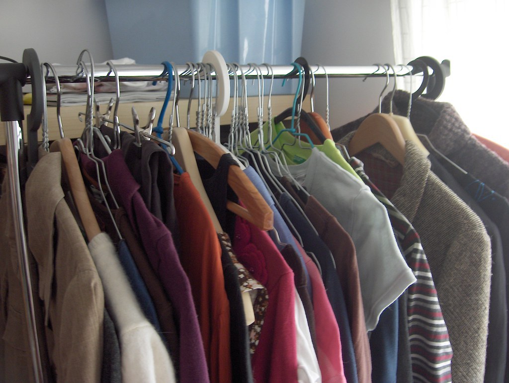 Clothing arranged on a retail rail; illustrative image, not a mawa-hangers.com product photograph